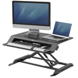 Fellowes Sit Stand Desk Riser - Lotus LT Height Adjustable Sit Stand Desk Converter with Convenient Device Channel - No Assembly Required - Max Weight 17KG - Black - 8215001